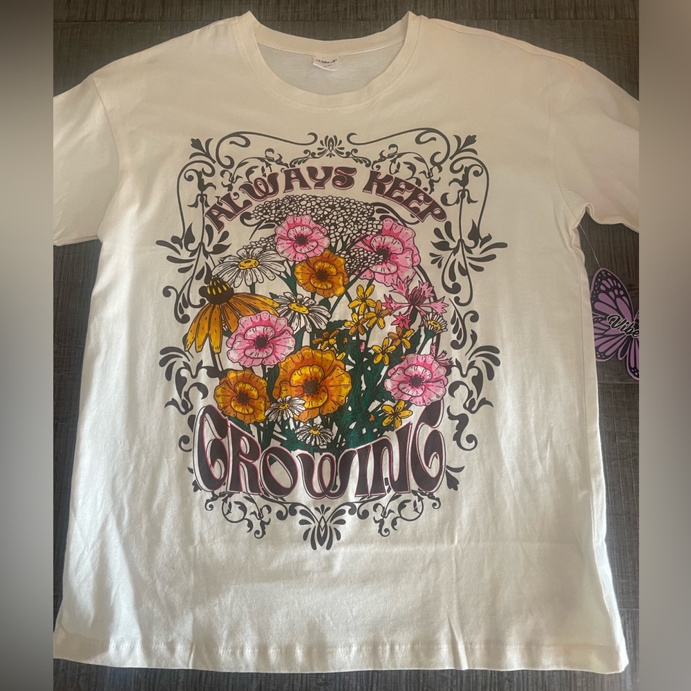 Unworn teeshirt, tags still on. plant shirt